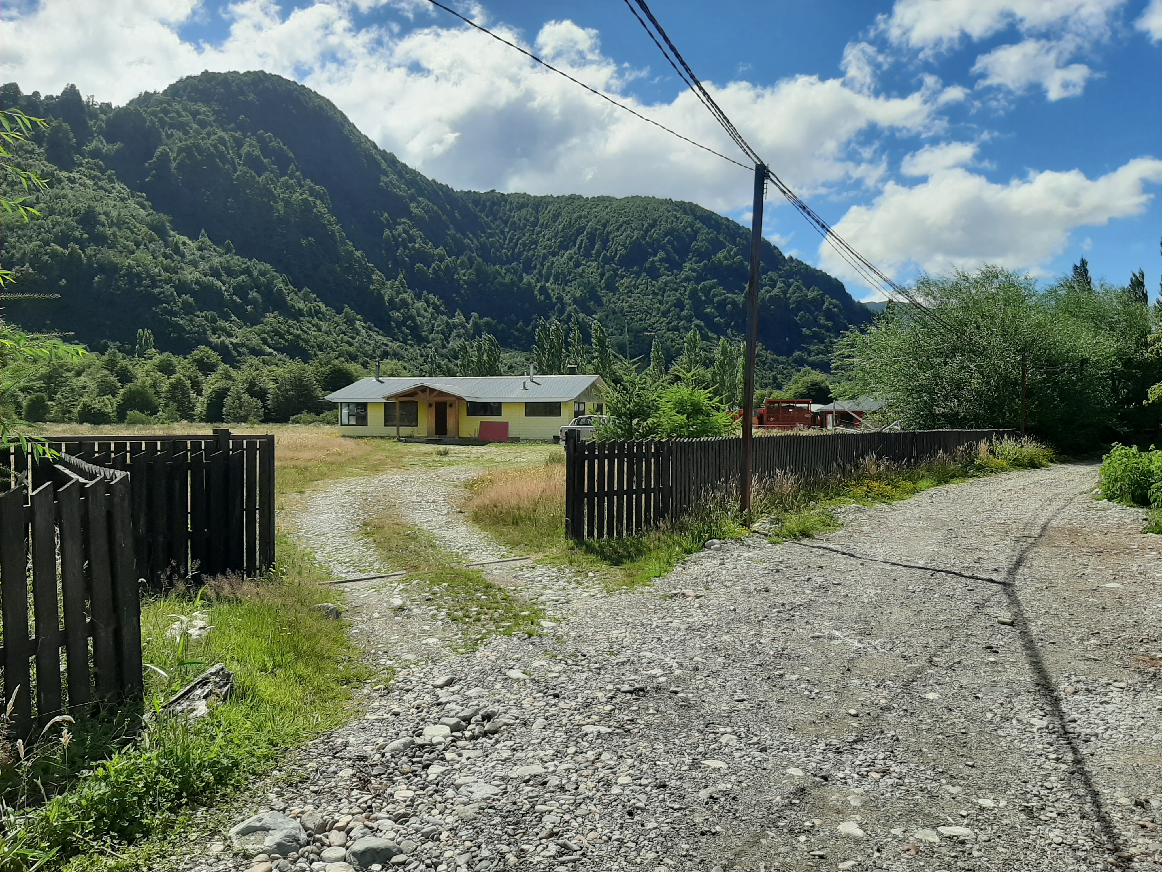 Front of the house with the surrounding land parcel visible