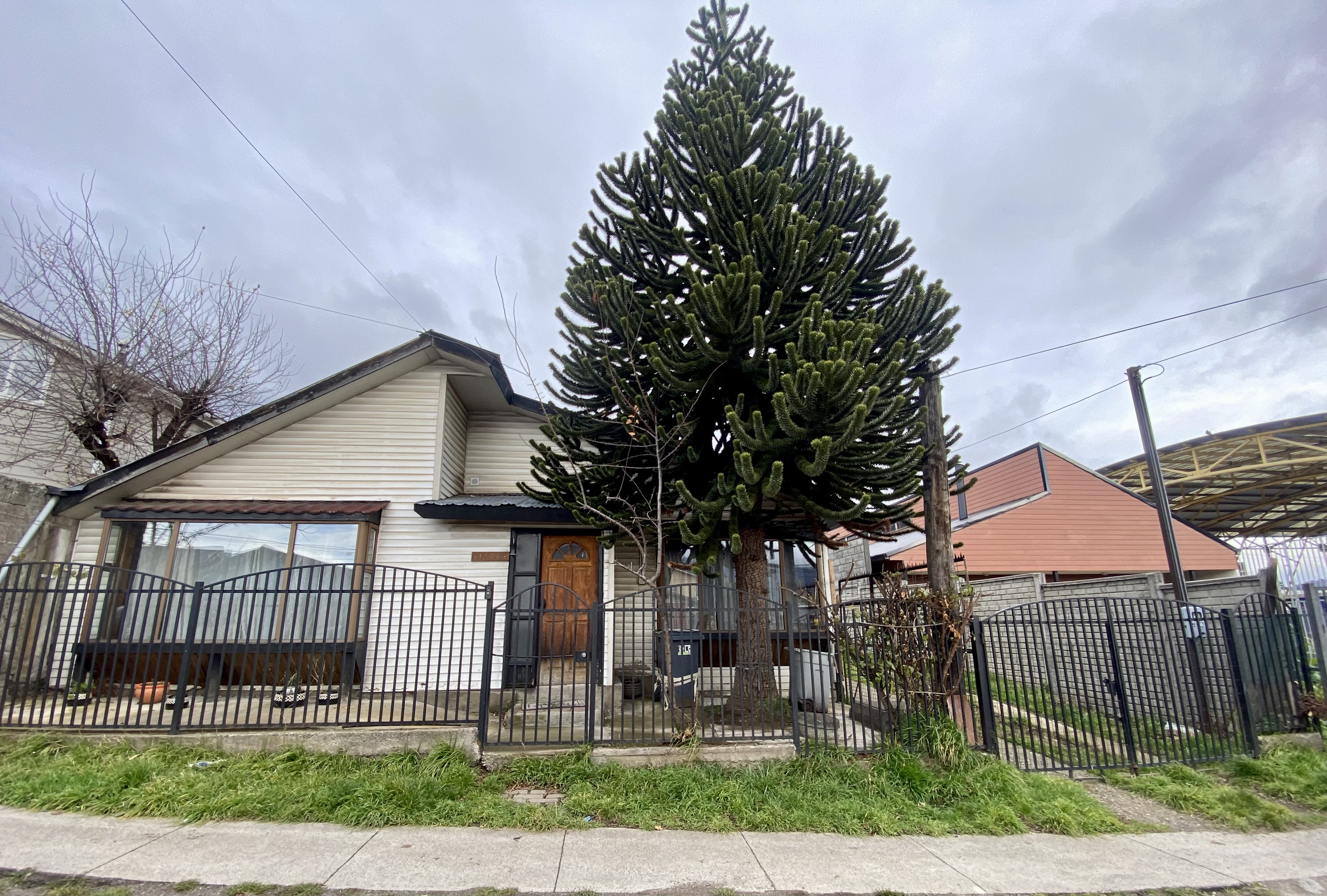 Front view of the house showcasing its architecture and design.