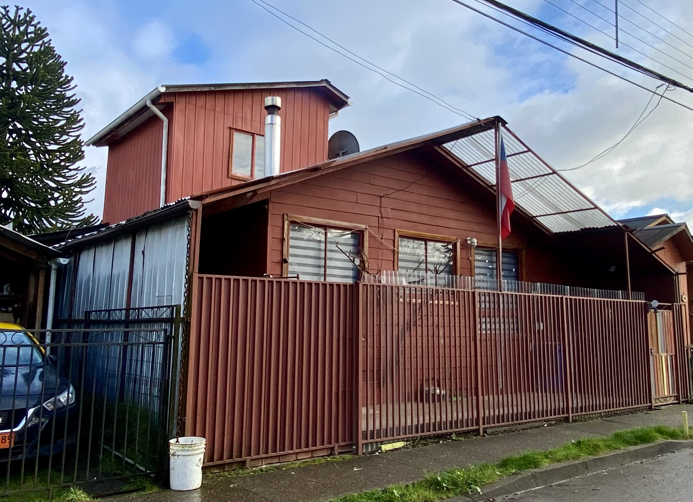 The house's facade with a fresh coat of paint