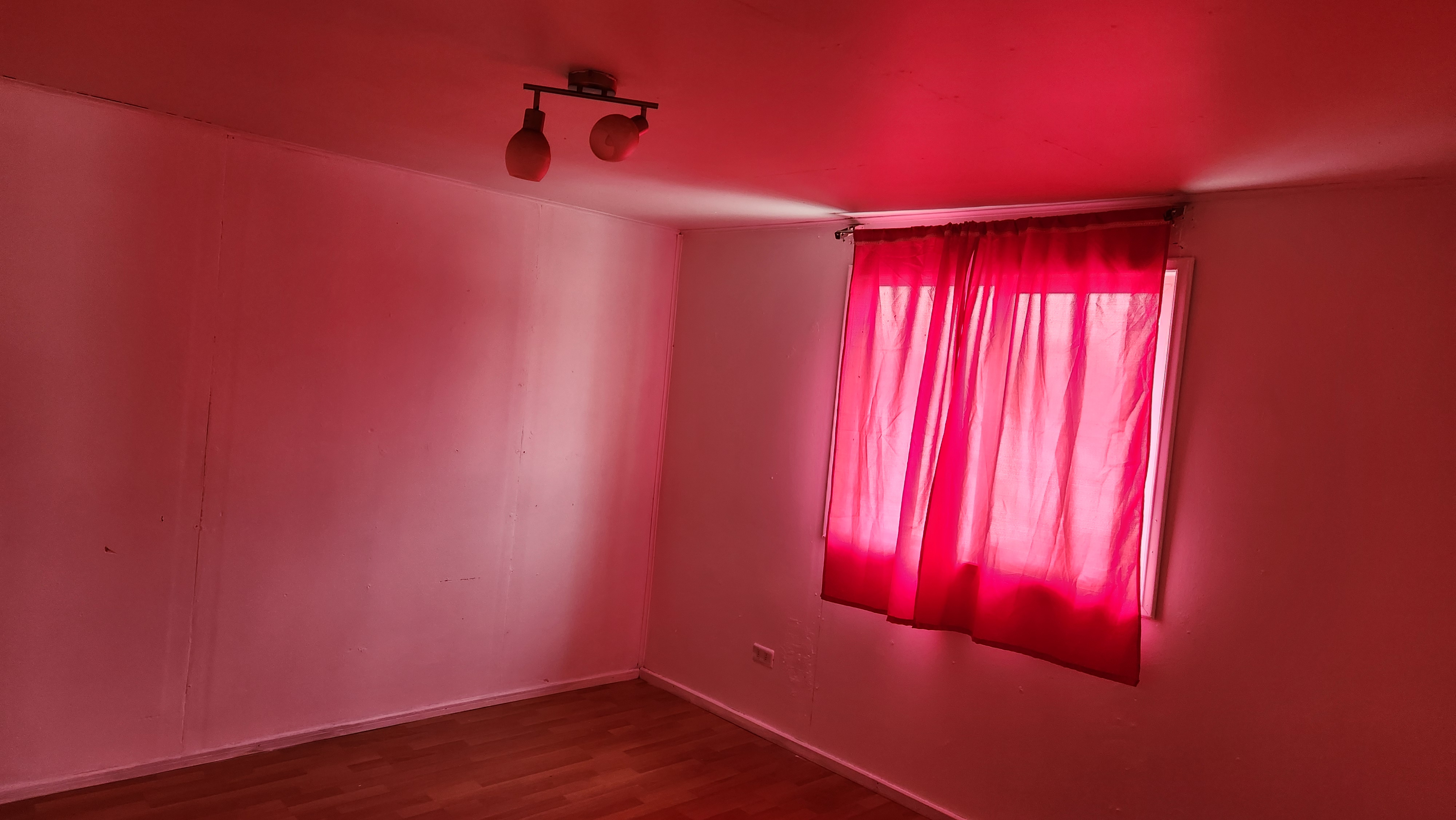 Detailed shot of the house's windows and facade.