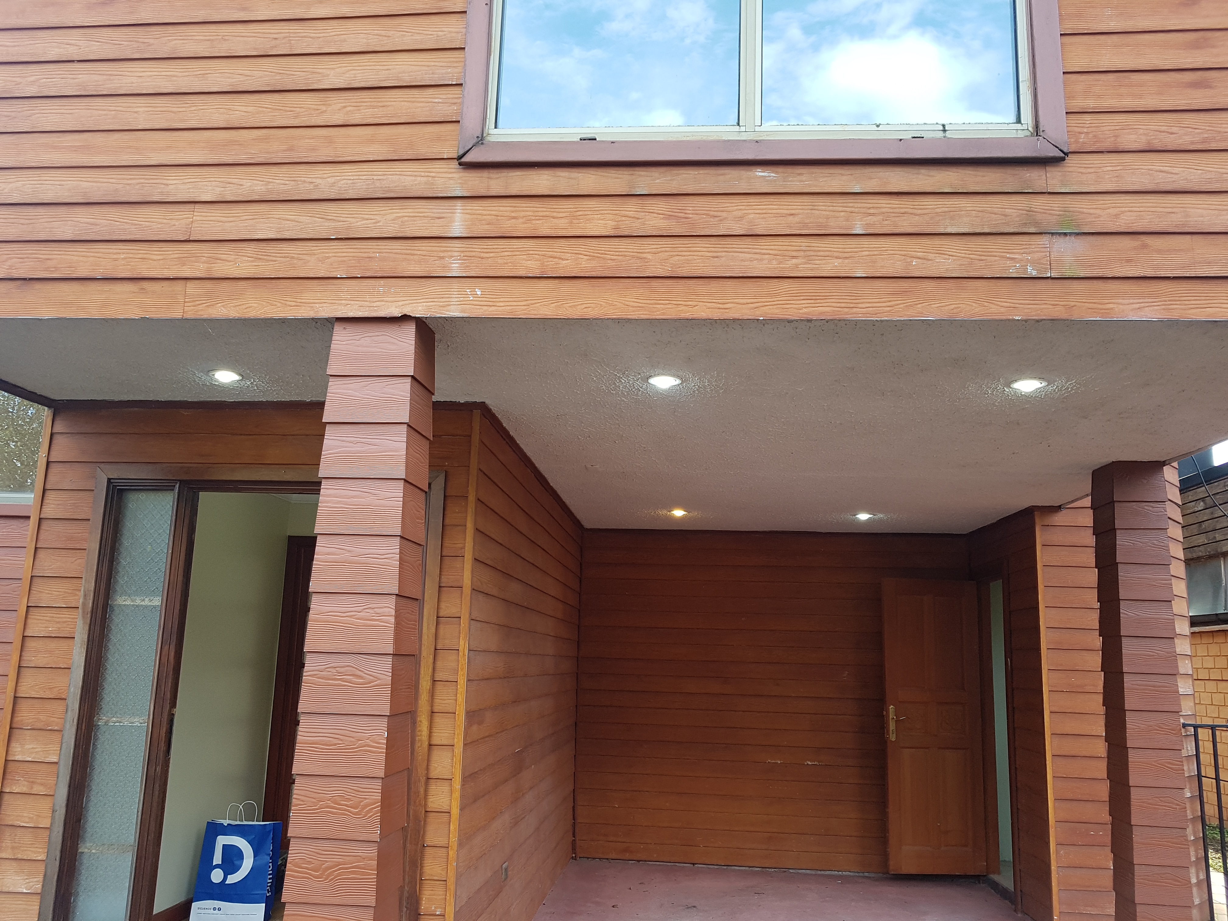 Rear view of the house and backyard in Puerto Aysen
