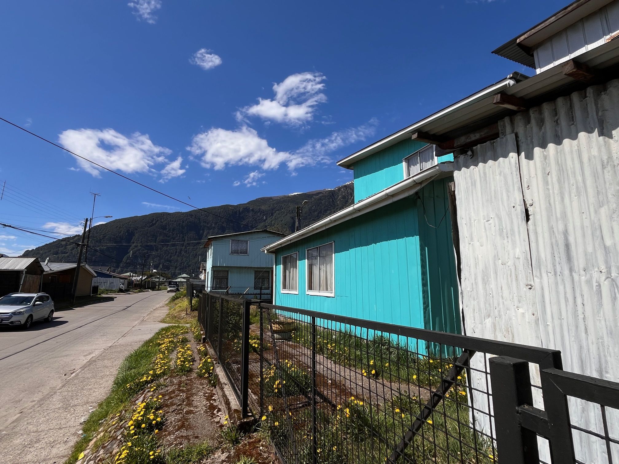 View of the property showing both the house and the cabin.
