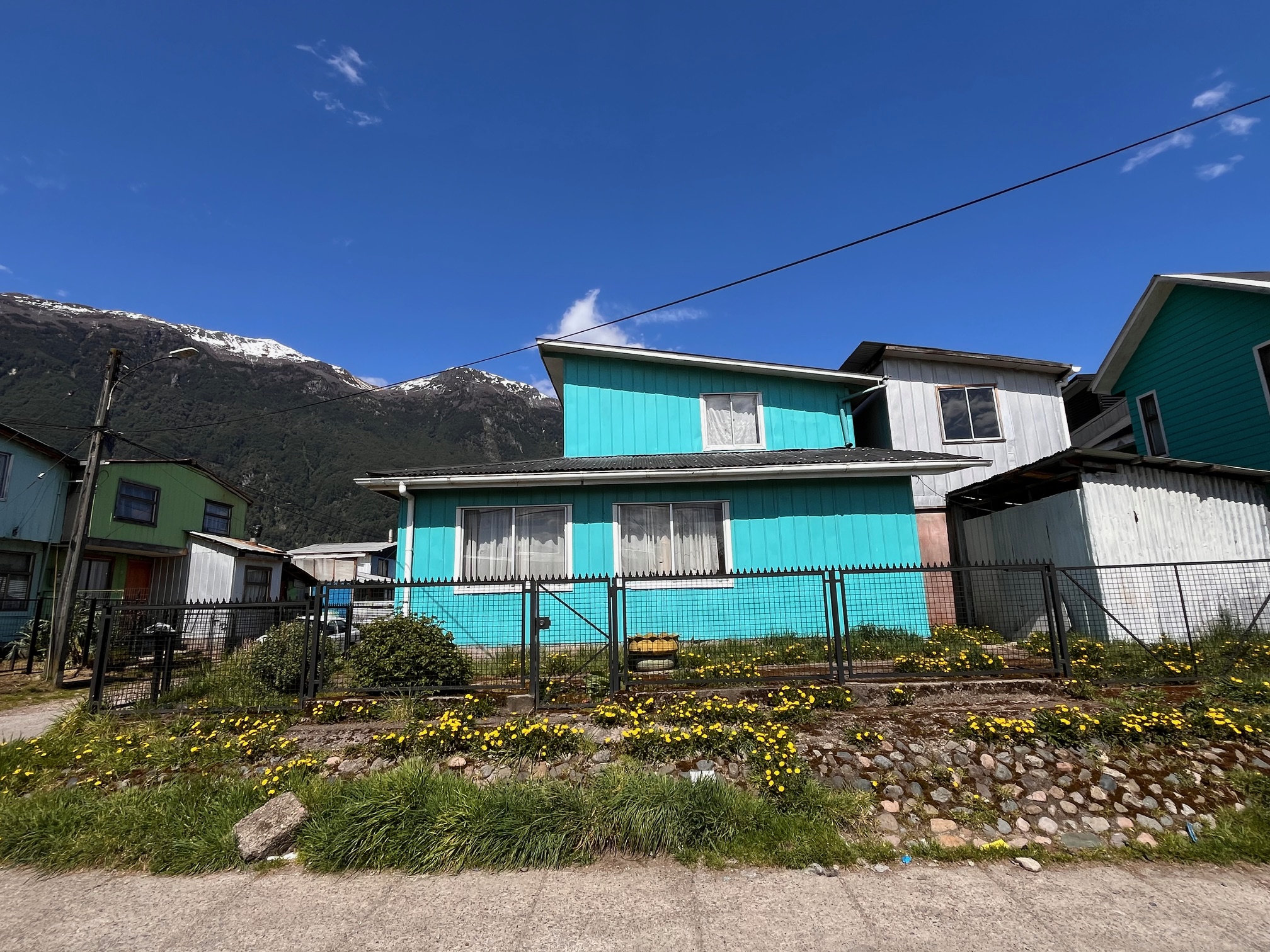 Landscape view of the property with the house and cabin in Puerto Aysen.