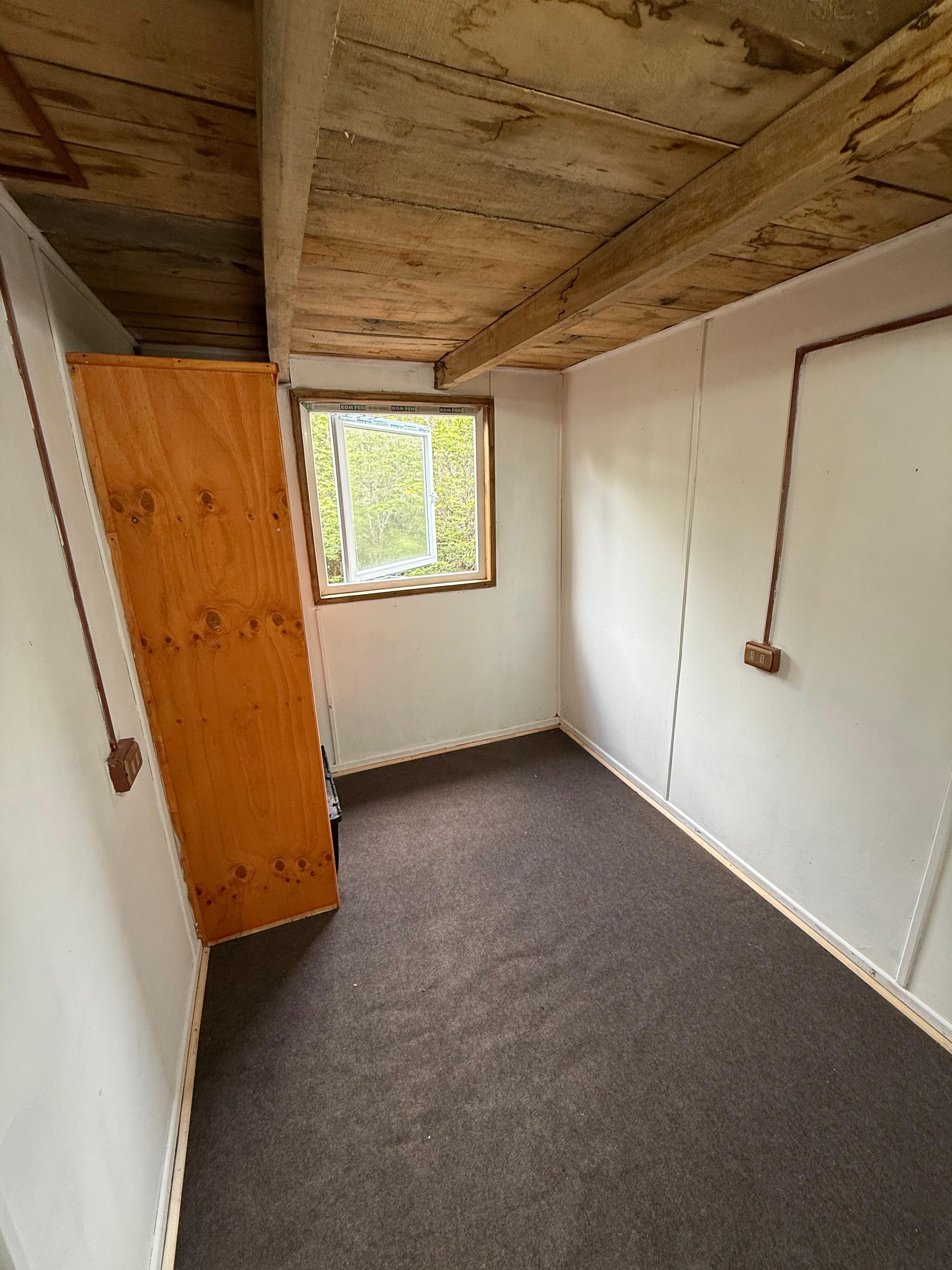 Image of the cabin's roof and chimney